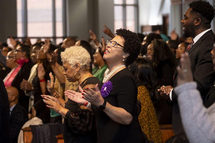 The audience reacts during a musical performance at the Dr. Martin Luther King Jr. Day program at Ebenezer Baptist Church in Atlanta on Monday, Jan. 15, 2024.  (Ben Gray / Ben@BenGray.com)