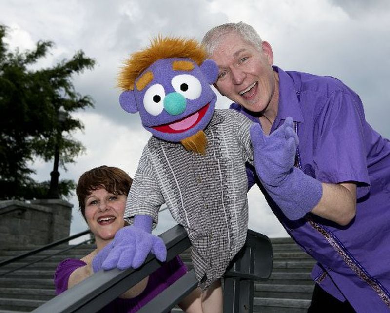 "Avenue Q" cast members Jill Hames and Jeff McKerley share the frame with puppet Nicky. PHIL SKINNER / FOR THE AJC