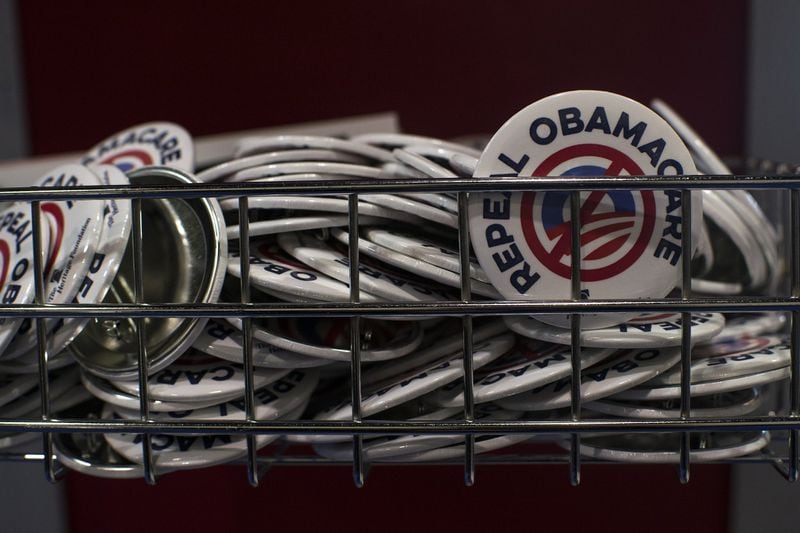 “Repeal Obamacare” buttons fill a basket at a Heritage Foundation booth during the Conservative Political Action Conference in Maryland earlier this year. Gabriella Demczuk/The New York Times