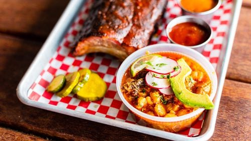 King Barbecue’s Red Pozole (lower right) is a Mexican soup that can serve as a side for a barbecue meal. As shown here, it can be topped with thin slices of radish and avocado. CONTRIBUTED BY HENRI HOLLIS