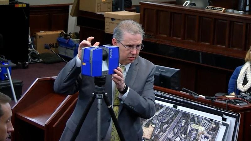 David Dustin, an expert in 3D laser scanning, describes to the jury how he maps a crime scene, during the murder trial of Justin Ross Harris at the Glynn County Courthouse in Brunswick, Ga., on Thursday, Oct. 27, 2016. (screen capture via WSB-TV)