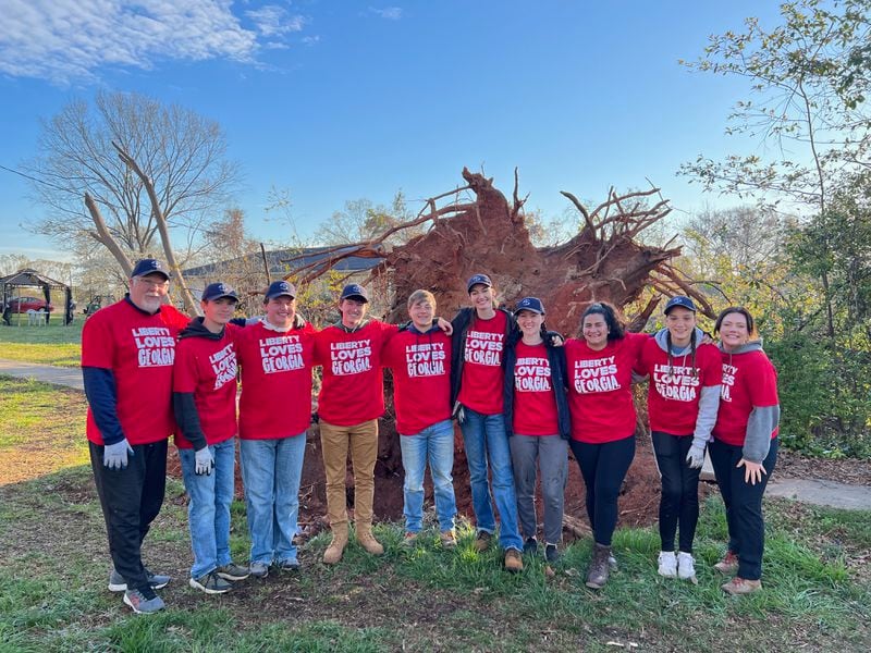 A group from Liberty University, mostly of students, came to Georgia for spring break to help repair damage from tornadoes in January 2023: (from left) Darren Hercyk (leader), Caleb Marcellus, Lukas Gawryluk, Eric Mullikun, Hayden Styer, Taylor Swartz, Samantha Burris, Natalia Garcia, Heidi Bosch, and Abigail Sanders (leader). (Courtesy of Liberty University)