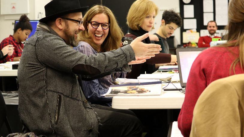 Kristian Bush and Janece Shaffer share a laugh at rehearsal for “Troubadour” while director Susan V. Booth looks on.