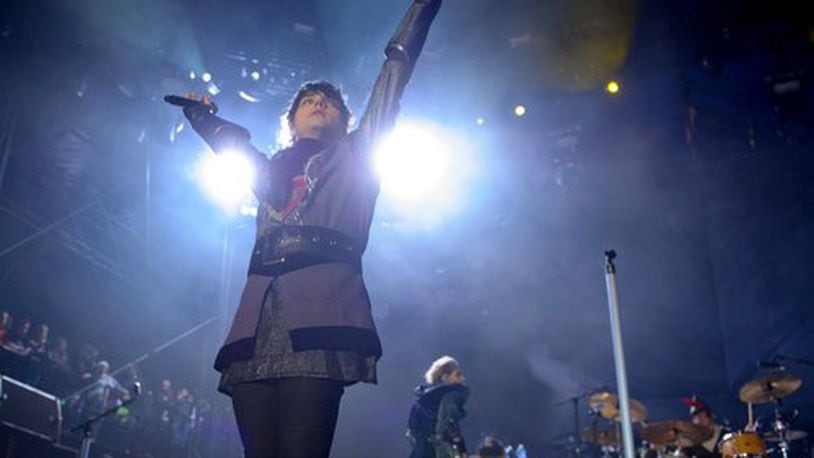 Gerard Way, of My Chemical Romance, revels in the crowd's cheers.