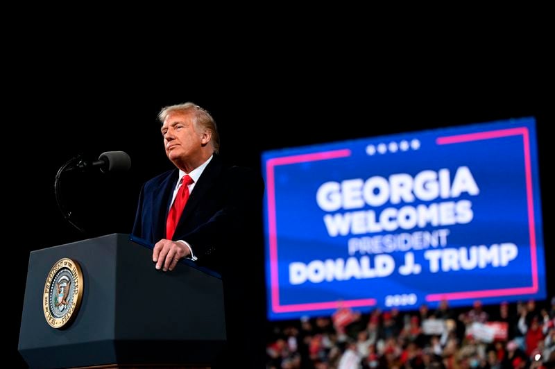 President Donald Trump speaks during a rally to support Republican Senate candidates at Valdosta Regional Airport in Valdosta, Georgia, on Saturday, Dec. 5, 2020. (Andrew Caballero-Reynolds/AFP/Getty Images/TNS)