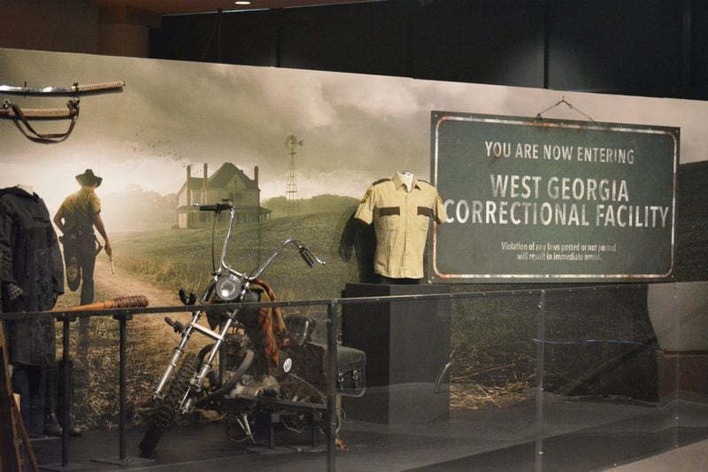 These artifacts from the “Walking Dead” are part of an exhibit at the Jimmy Carter Presidential Library that tells the history of movie-making in Georgia, and Carter’s role in promoting the industry. CONTRIBUTED: CARTER LIBRARY
