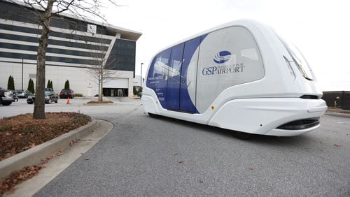 During the live on-site demonstration, the autonomous vehicle drives through the parking lot of the Kimpton Overland Hotel on Thursday, December 9, 2021. 
The vehicle can reach a speed of up to 25 miles per hour. Miguel Martinez for The Atlanta Journal-Constitution 