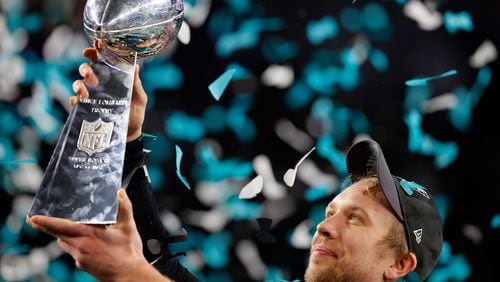 Nick Foles of the Philadelphia Eagles celebrates with the Vince Lombardi Trophy after his teams 41-33 victory over the New England Patriots in Super Bowl LII at U.S. Bank Stadium on February 4, 2018 in Minneapolis, Minnesota. The Philadelphia Eagles defeated the New England Patriots 41-33.  (Photo by Kevin C. Cox/Getty Images)