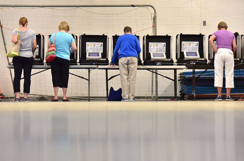 DeKalb County voters go to the polls at Henderson Mill Elementary School on Georgia’s state primary Election Day, May 24. HYOSUB SHIN / HSHIN@AJC.COM