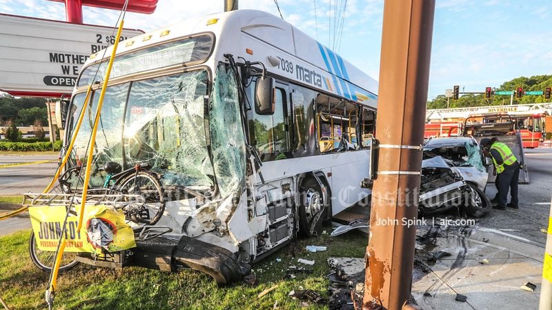 The MARTA bus driver, a passenger and the driver of a car were all injured in the wreck, according to the transit agency.