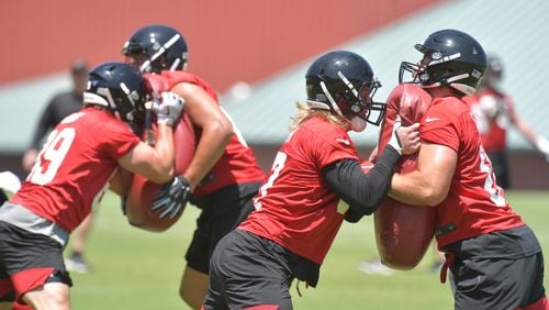 May 30, 2019 Flowery Branch - Atlanta Falcons tight end Jaeden Graham and tight end Luke Stocker (right) battle during team practice at Atlanta Falcons Training Camp in Flowery Branch on Thursday, May 30, 2019. The Falcons are in the second week of Phase Three of the offseason program. They have another week of OTAs before the mandatory minicamp, which is set for June 11 through 13. HYOSUB SHIN / HSHIN@AJC.COM