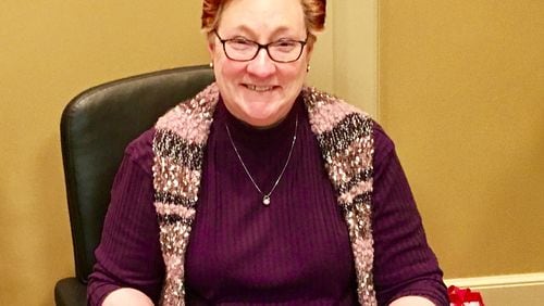 Peggy Merriss, at the close of her final meeting as Decatur city manager on Monday Dec. 17. Merriss had presided over the city for 25 1/2 years. Bill Banks for the AJC