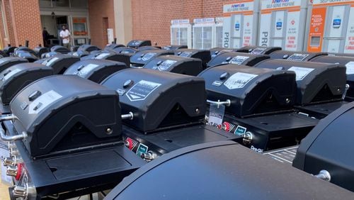 Line-up of popular grills outside Home Depot on Cumberland Parkway. The massive retailer may reap most of its revenue from home improvement, but it also sells items for the owner's enjoyment of the home.