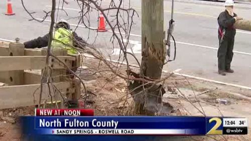 This utility pole was damaged in a deadly car crash in Sandy Springs.