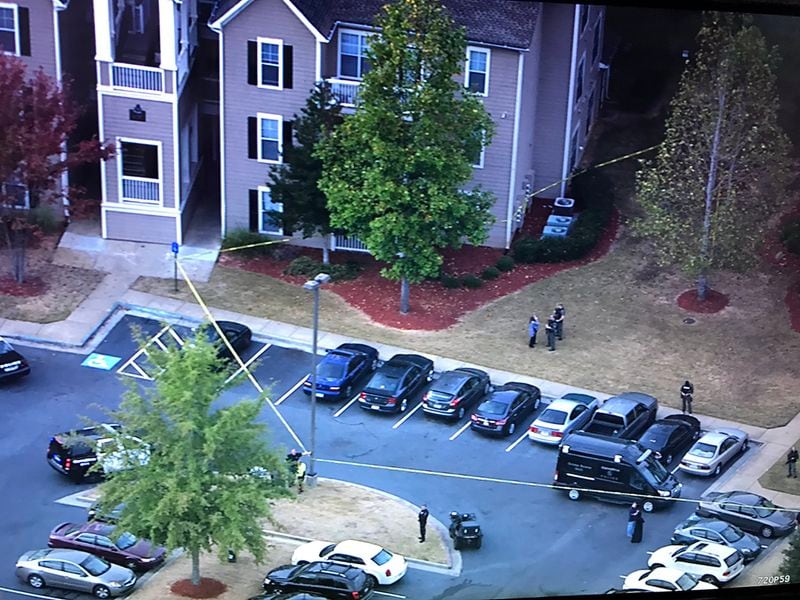 A man was shot to death near the entrance of the River Pointe Apartments in Carrollton, police said. (Credit: Channel 2 Action News)