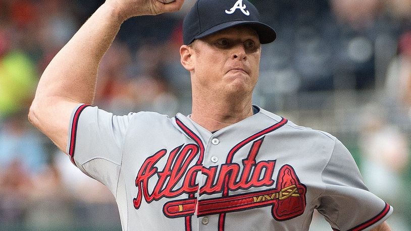 Atlanta Braves starting pitcher Gavin Floyd (32) delivers a pitch against the Washington Nationals during the first inning of their game at Nationals Park in Washington, D.C, Thursday, June 19, 2014.(Harry E. Walker/MCT)