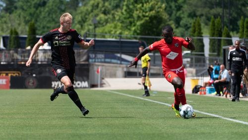 Atlanta United 2's Chris Allan (8) attempts to cut off the advance of a Birmingham Legion attacker during a USL match Sunday, May 30, 2021, at Fifth Third Stadium in Kennesaw. (Mitchell Martin/Atlanta United)