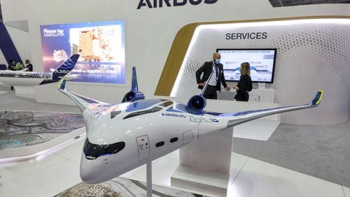 This picture taken on November 14, 2021 shows a mockup of one of the blended-wing body concepts of the "Airbus ZEROe" zero-emissions hybrid-hydrogen aircraft, at the booth of a European multinational aerospace corporation Airbus SE, during the 2021 Dubai Airshow in the Gulf emirate. (GIUSEPPE CACACE/AFP via Getty Images/TNS)