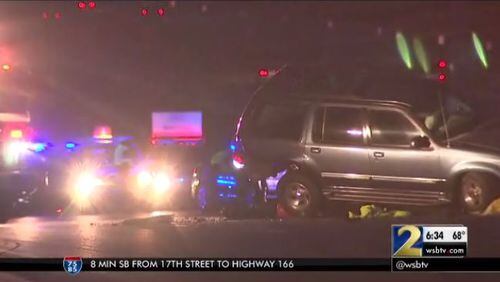 An Alpharetta man was hit and killed moments after getting out of his SUV Monday in Cobb County. (Credit: Channel 2 Action News)