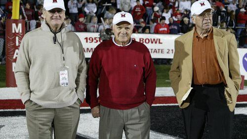 John Pont (center) with fellow members of the Cradle of Coaches Bo Schembechler (left) and Bill Mallory at a game at Yager Stadium in Oxford.