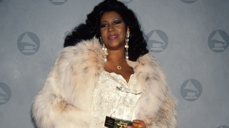 Aretha Franklin holding her award in Press Room at 1990 Grammy Awards. (Photo by Time Life Pictures/DMI/The LIFE Picture Collection/Getty Images)