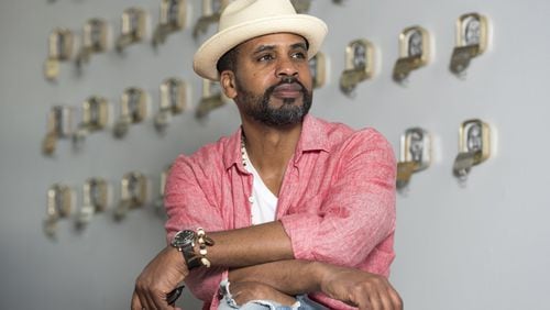 Atlanta-based artist and actor Masud Olufani poses for a portrait in his studio in Atlanta, Georgia, on Tuesday, March 21, 2017. Being an accomplished visual artist, Olufani has been involved in numerous artistic endeavors, which includes a recurring role in BET’s, “The Quad.” Olufani draws inspiration from many art forms and his artwork often informs his work on screen. (DAVID BARNES / DAVID.BARNES@AJC.COM)