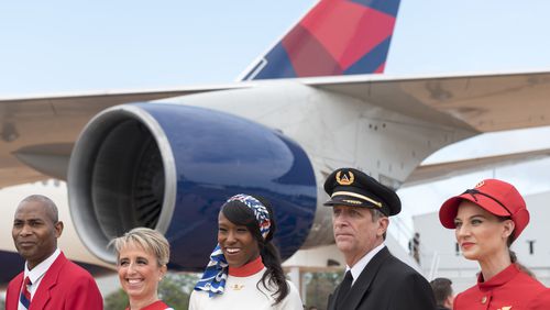 March 28, 2017, Atlanta - Delta employees dressed in vintage uniforms pose for photos before a ribbon cutting ceremony to celebrate the opening of the Delta Museum 747 Experience Exhibit in Atlanta, Georgia, on Tuesday, March 28, 2017. Speaking on the the retiring of ship 6301 to open the 747 Experience Exhibit, Delta President Glen Hauenstein stated, "We believe that the golden age of aviation is in the future." (DAVID BARNES / DAVID.BARNES@AJC.COM)