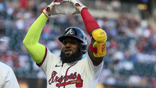Atlanta Braves designated hitter Marcell Ozuna celebrates after hitting a RBI single during the first inning against the Miami Marlins at Truist Park, April 24, 2024, in Atlanta. (Jason Getz / AJC)