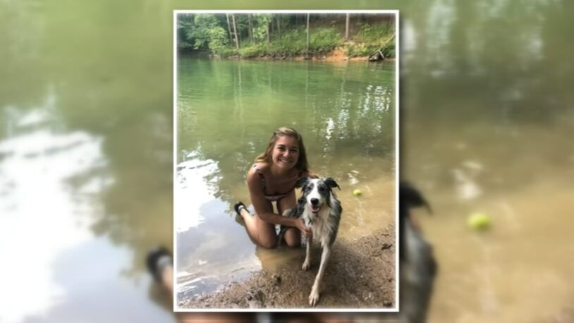 Morgan Fleming and her husband, Patrick, said their dog Arya died Saturday after swimming in Allatoona Lake. Credit: WSB-TV