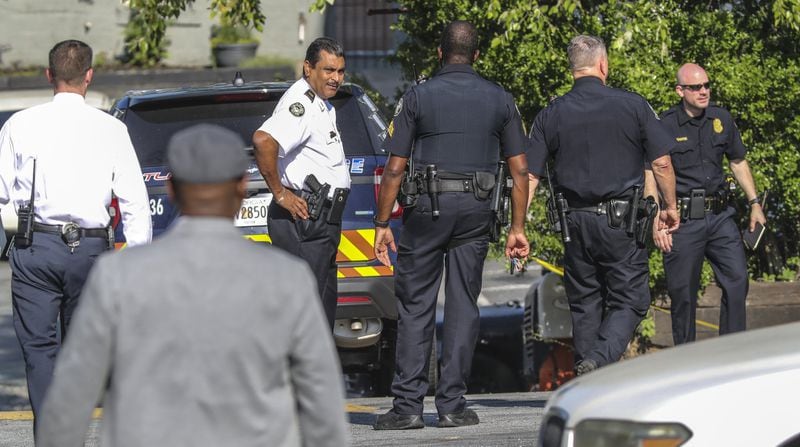 Criminal activity led to a shooting that left a man dead at a Buckhead shopping center on June 17, 2019, Atlanta police said. Investigators found the man lying outside a car at the Bennett Street Shopping Center near the intersection of Peachtree Road and Bennett Street around 8:30 a.m. that Monday. He appeared to have been involved in some form of criminal activity that resulted in him being shot, Maj. Michael O’Connor said. A Dodge Challenger at the scene fit the description of a vehicle used in multiple car break-ins Sunday night, according to police. Officers were alerted to be on the lookout for a white Challenger or Charger with three people inside. (JOHN SPINK / AJC)