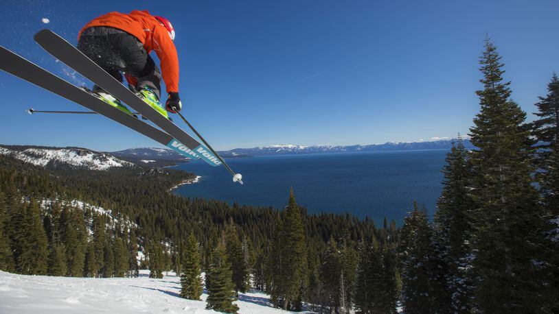 Professional skier Errol Kerr catches both air and views of Lake Tahoe while powder skiing at Homewood Mountain Resort.(Ryan Salm Photography/North Lake Tahoe)