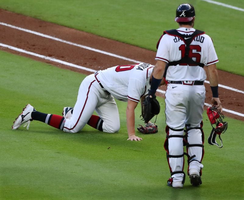 Braves starting pitcher Michael Soroka falls to the ground suffering a torn right Achilles’ tendon on Monday, Aug. 3, 2020 in Atlanta. (Curtis Compton/AJC file)