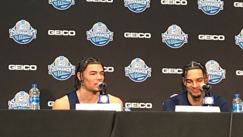 Georgia Tech forward Jordan Usher (left) and guard Michael Devoe field questions at a postgame news conference after the Yellow Jackets' 84-74 loss to Louisville in the first round of the ACC Tournament on Tuesday night in New York. (AJC photo by Ken Sugiura)