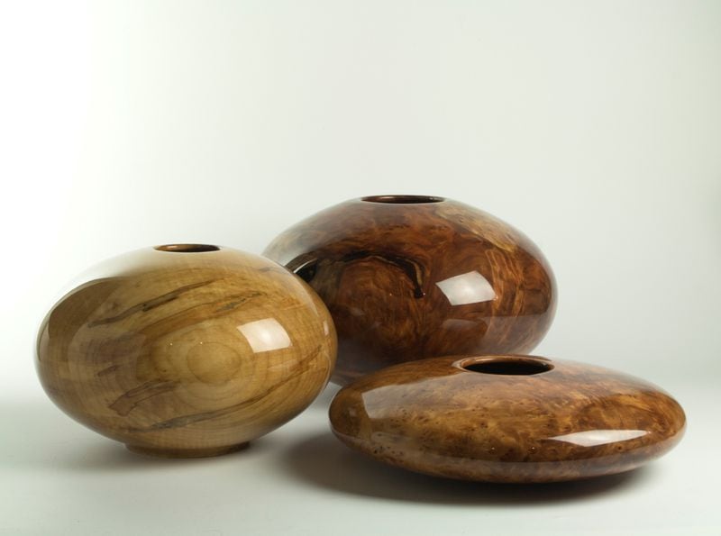 Wood-turned vessel by Philip Moulthrop of big leaf maple (left) and two by Matt Moulthrop of California redwood are included in the exhibit "Edward, Philip and Matt Moulthrop: Western Woods," on view through Oct. 4 at Booth Western Art Museum. 
Contributed by Booth Western Art Museum
