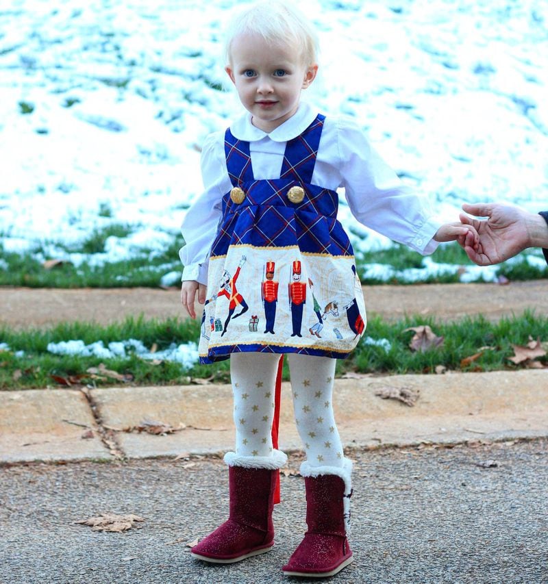Eleanor Emerson Pratt, 3, enjoyed her first outing to see “The Nutcracker” by the Atlanta Ballet, and proudly wore her Toy Soldier dress to the event. CONTRIBUTED BY LANE PRATT