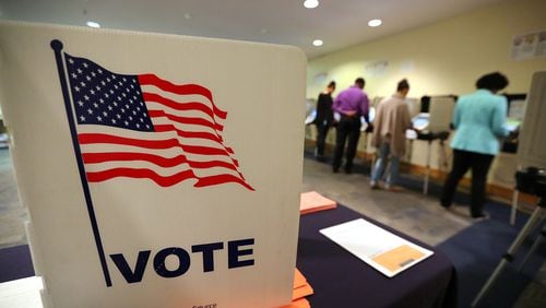 Early voters cast their ballots at the Buckhead Library in November. Curtis Compton/ccompton@ajc.com