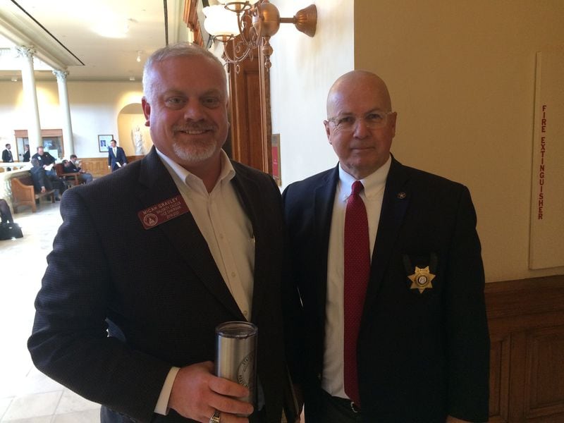 State Rep. Micah Gravley, left, sponsor of the Georgia medical marijuana bill, and Terry Norris, executive director of the Georgia Sheriffs Association, the bill’s biggest opponent.