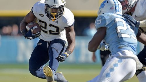 CHAPEL HILL, NC - NOVEMBER 03: Clinton Lynch #22 of the Georgia Tech Yellow Jackets runs for a first down against the North Carolina Tar Heels  during the fourth quarter of their game at Kenan Stadium on November 3, 2018 in Chapel Hill, North Carolina. Georgia Tech won 38-28.  (Photo by Grant Halverson/Getty Images)