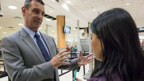 TSA administrator David Pekoske talks with a reporter in front of the main security checkpoint at Hartsfield-Jackson International Airport, Thursday. STEVE SCHAEFER / SPECIAL TO THE AJC