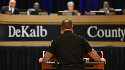 DeKalb Police Chief James Conroy stands before commissioners during DeKalb County Commission meeting on Tuesday, Dec. 5, 2017. The DeKalb Board of Commissioners voted 7-0 Tuesday to delay a decision until next week on whether to cut off alcohol service at 2 a.m. in unincorporated areas. Commissioners asked county police to compile crime statistics surrounding late-night bars before reducing their hours. HYOSUB SHIN / HSHIN@AJC.COM