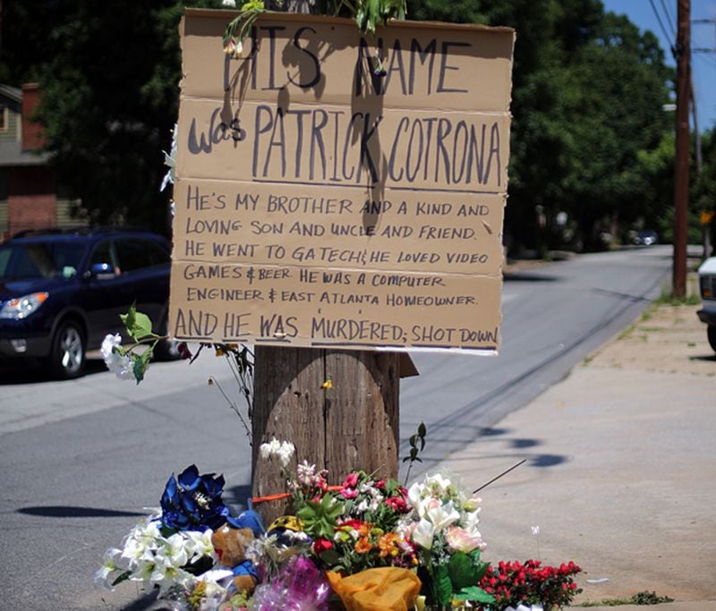 A memorial, shown in this AJC file photo, at May Avenue SE and Flat Shoals Avenue SE in East Atlanta marks the intersection where Patrick Cotrona was shot and in May 2013 while walking with friends.