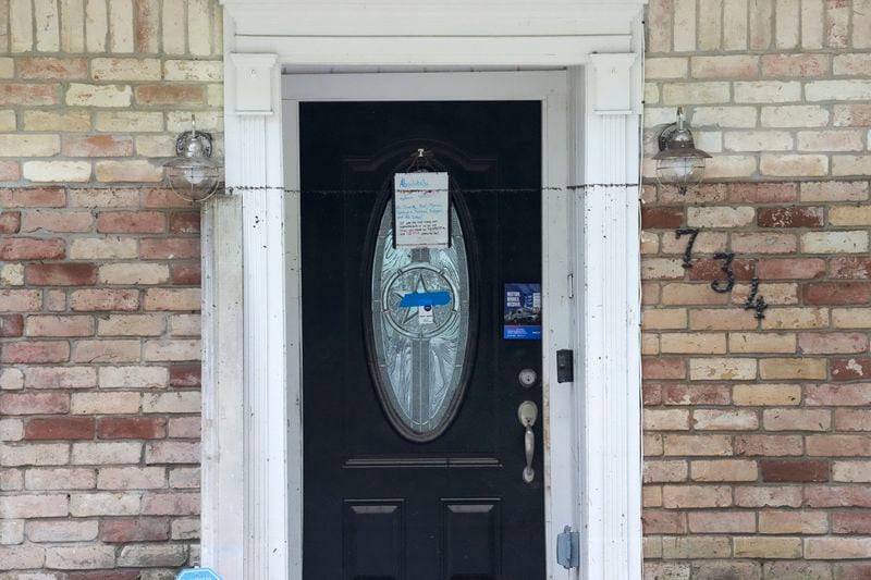 The water line goes almost to the top of the front door of a home in the River Plantation neighborhood on Monday, May 6, 2024, in Conroe, Texas. (Brett Coomer/Houston Chronicle via AP)