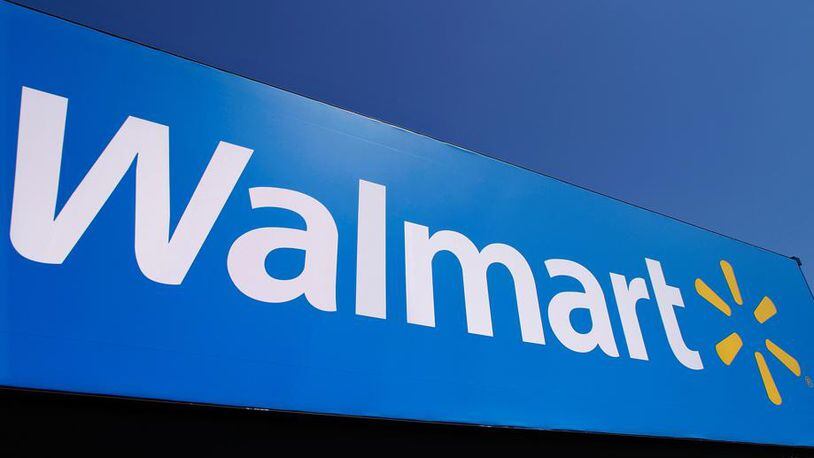 Five metro Atlanta Walmart stores have moved up their closing times from 11 p.m. to 9 p.m. (AJC file photo)