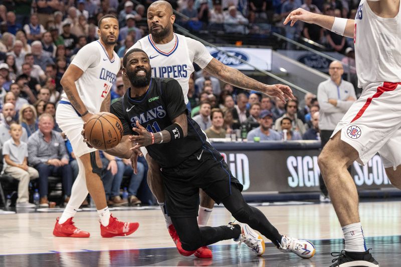 Dallas Mavericks guard Kyrie Irving (11) passes the ball as he falls in front of Los Angeles Clippers forward P.J. Tucker and guard Norman Powell (24) during the second half of an NBA basketball first-round playoff series Friday, May 3, 2024, in Dallas. (AP Photo/Jeffrey McWhorter)