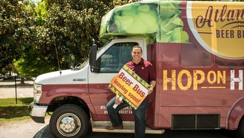 Travis Irions launched the “hop-on/hop-off” Atlanta Beer Bus. CONTRIBUTED BY MIA YAKEL