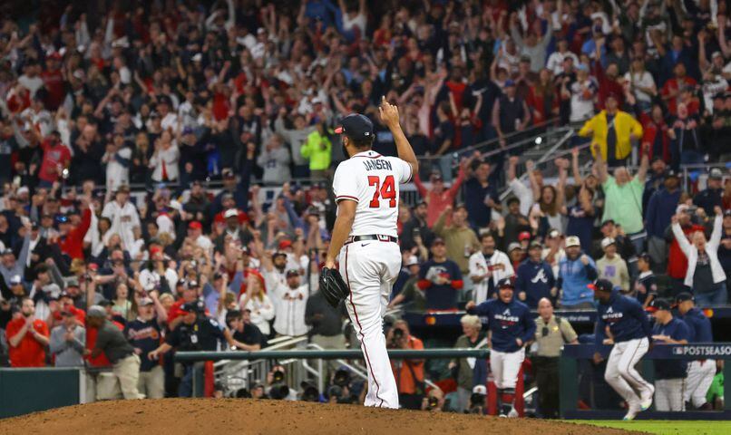 Atlanta Braves relief pitcher Kenley Jansen (74) signals to the crowd after closing the ninth inning of game two of the National League Division Series with a 3-0 win against the Philadelphia Phillies at Truist Park in Atlanta on Wednesday, October 12, 2022. (Jason Getz / Jason.Getz@ajc.com)