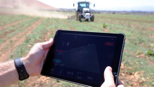An iPad displays the pattern that a tractor will follow as it plows the field on a farm in Hollister, Calif., Aug. 30, 2019. From equipment automation to data collection and analysis, the digital evolution of agriculture is already a fact of life on farms across the United States. (Jim Wilson/The New York Times)
