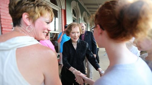 (file photo) Rosalynn Carter shakes hands as she arrives at her birthday party on August 22, 2015 in Plains, Georgia. Ben Gray / bgray@ajc.com