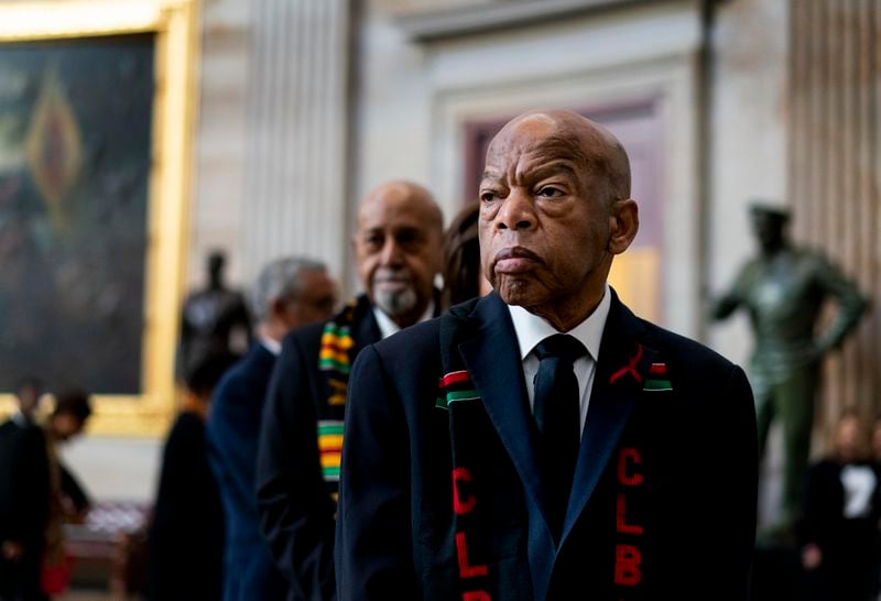 Congressman John Lewis (D-GA) prepares to pay his respects to U.S. Rep. Elijah Cummings (D-MD) who lies in state within Statuary Hall during a memorial ceremony on Capitol Hill on October 24, 2019 in Washington, DC. (Melina Mara/Pool/Getty Images/TNS)