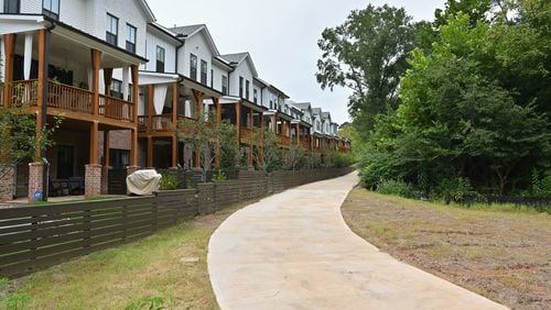 An image of Chelsea Walk in Alpharetta, a townhouse community by The Providence Group. The Providence Group and nine property owners partnered in a lawsuit against Johns Creek in 2018 after City Council denied rezoning for new housing. Credit: Hyosyb Shin